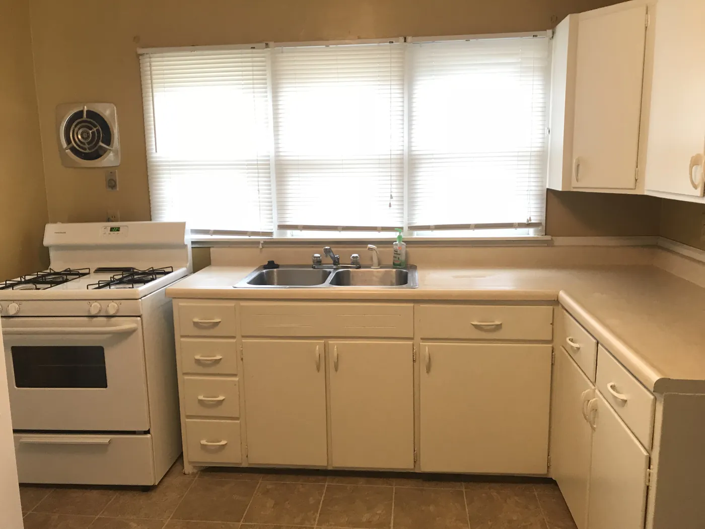 Kitchen with gas range and plenty of cabinets