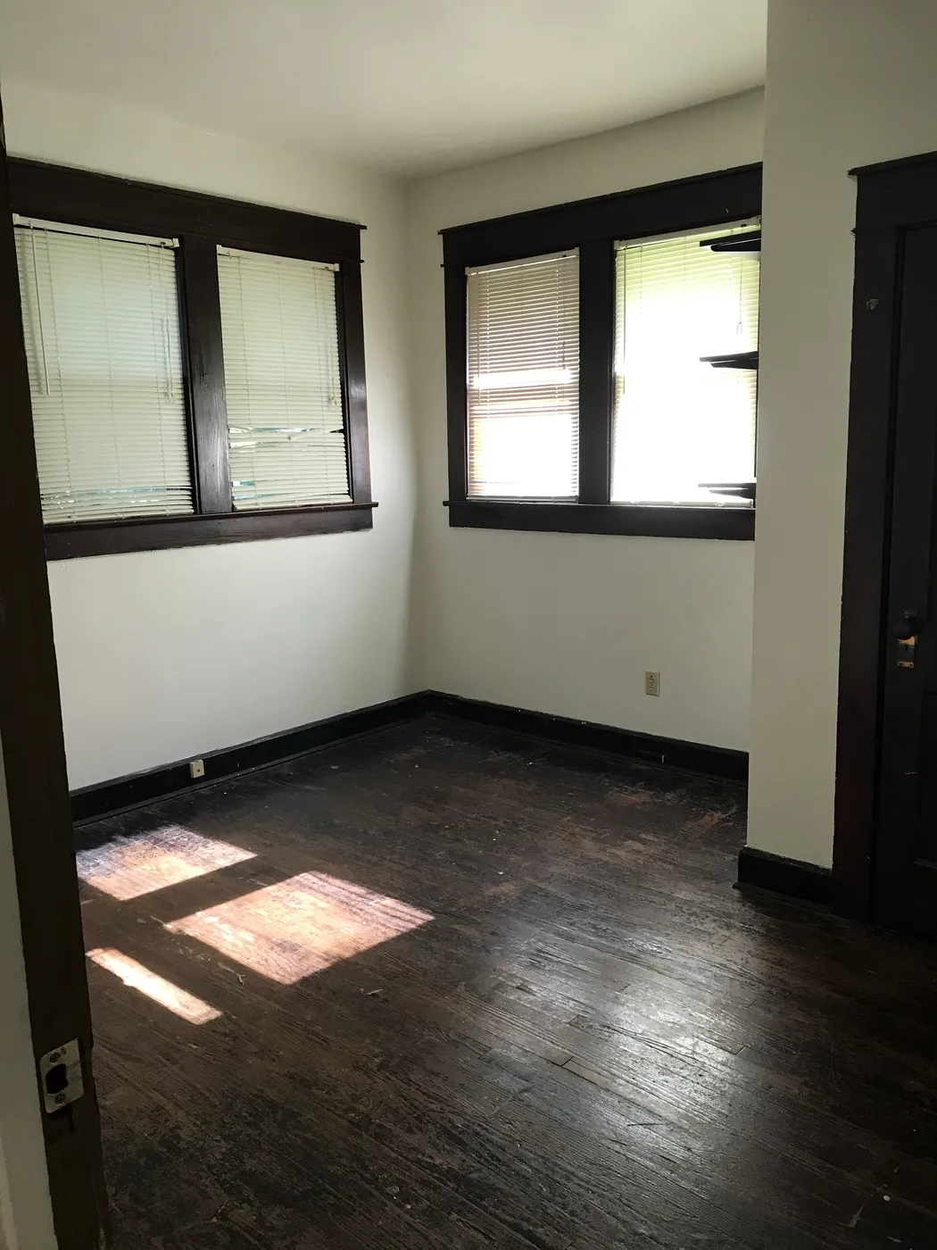 Sunny bedroom with hardwood floors