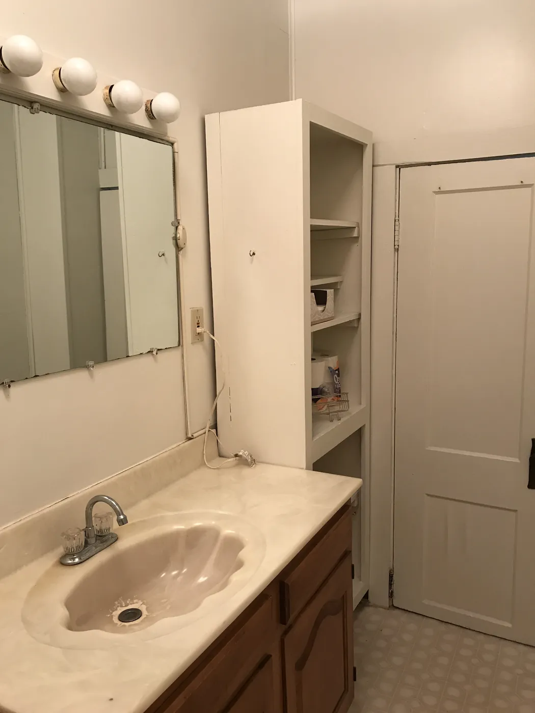 Bathroom vanity and linen storage