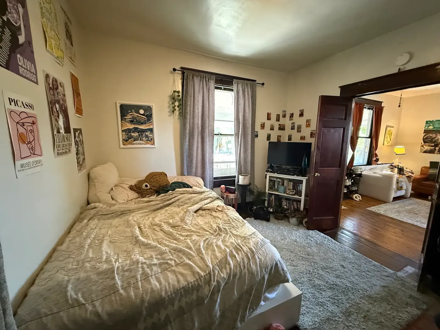 Bedroom with window and hardwood floors