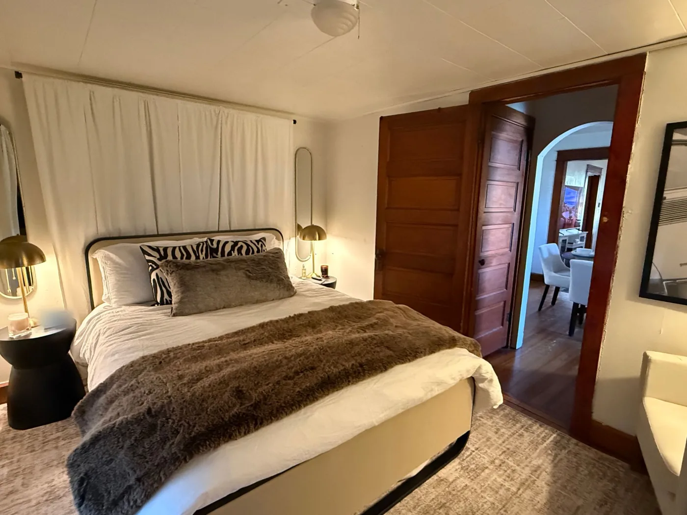 Bedroom with original wood doors